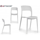 białe otwarte plastikowe krzesło