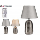 large cylindrical silver lamp