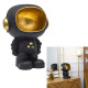 statue astronaut empty pocket black